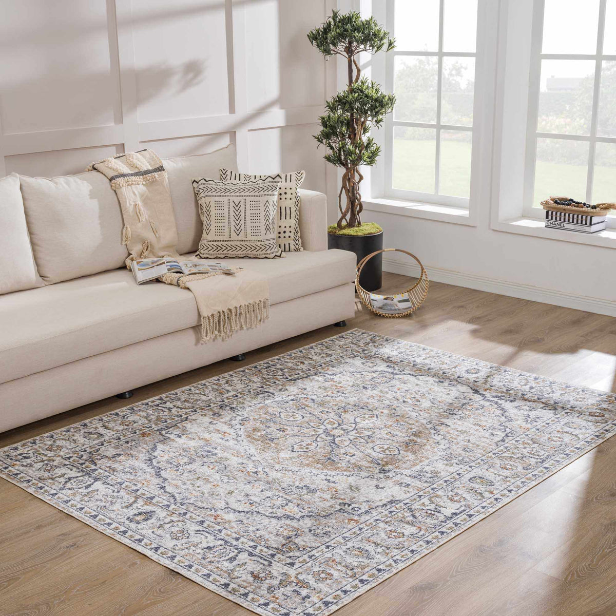 Boutique Rugs Hiti Cream flat pile washable rug in a cozy living room setting with neutral tones and soft textures.