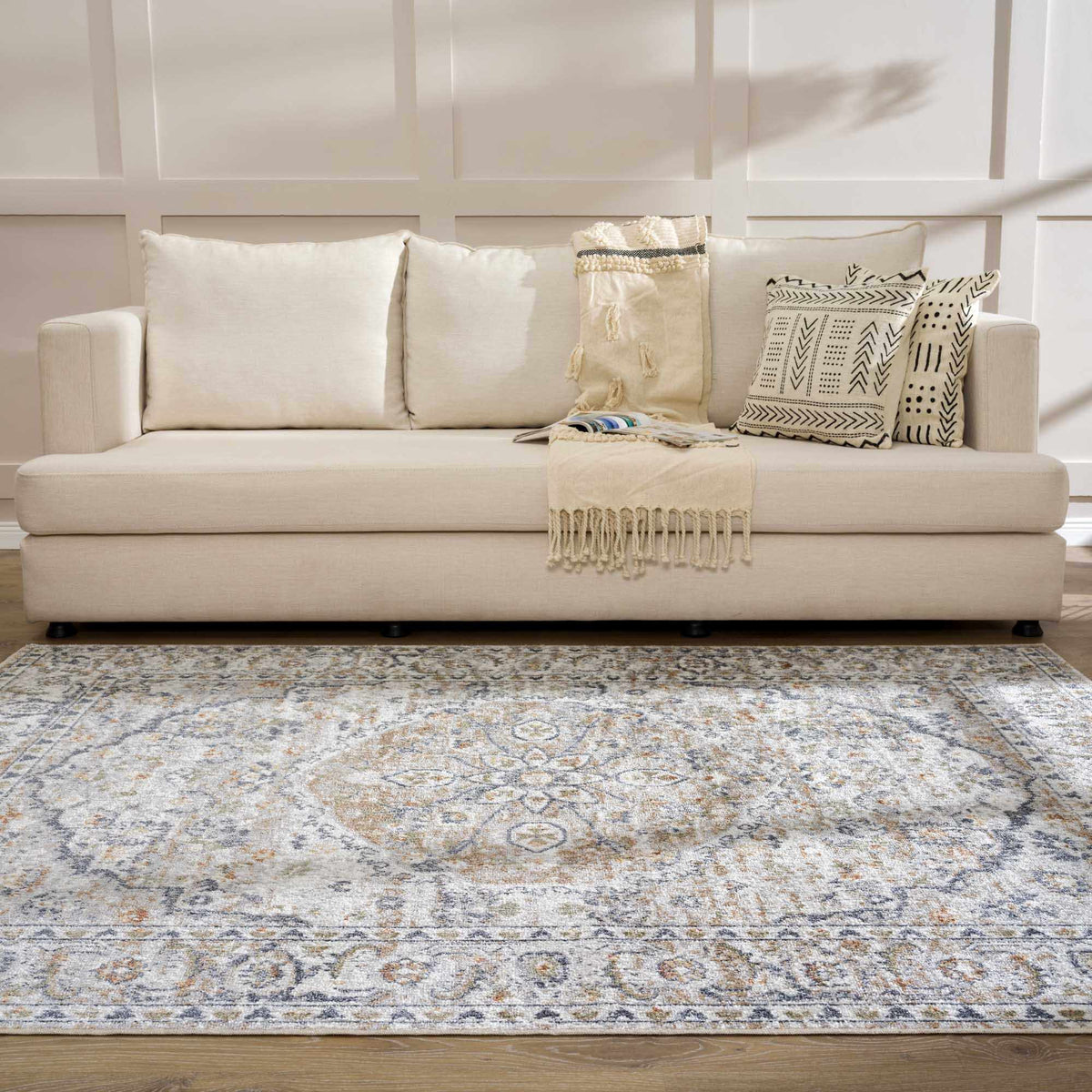 Boutique Rugs Hiti Cream flat pile washable rug in a cozy living room setting with neutral tones and textured surface.