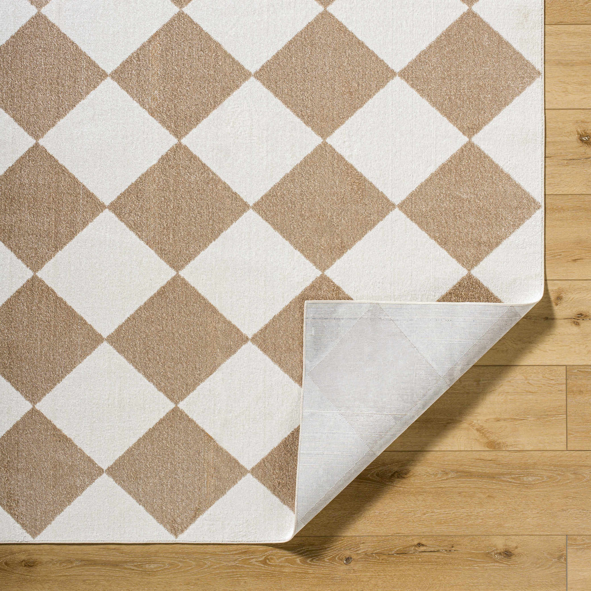 Hauteloom Ulric washable area rug folded, soft textured rug suitable for living rooms and bedrooms or decorative spaces