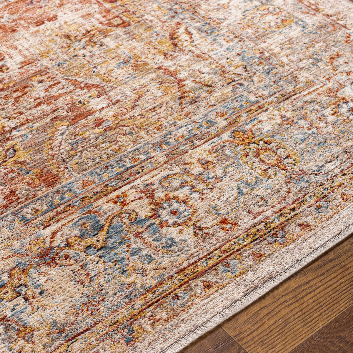 Close-up of the textured Marieville Luxe Performance Rug by Boutique Rugs showcasing its soft, luxurious pattern and rich fabric details.
