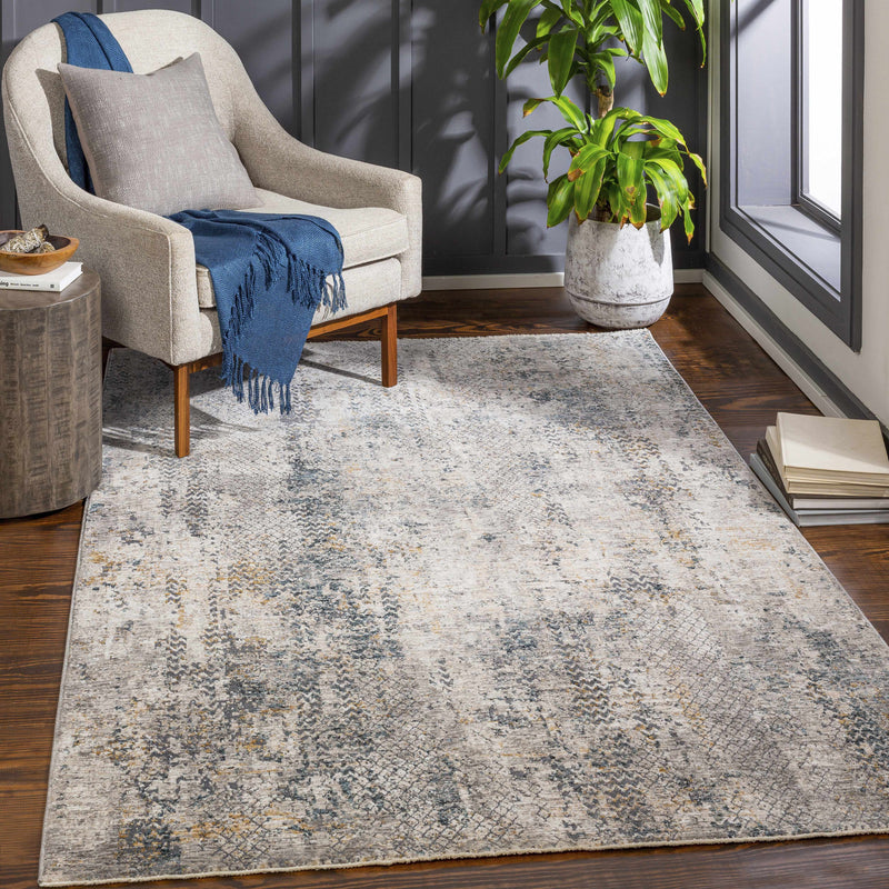 Boutique Rugs Odell Abstract Luxe Fringe Rug in a stylish room scene, showcasing its vibrant colors and textured fringe detail.