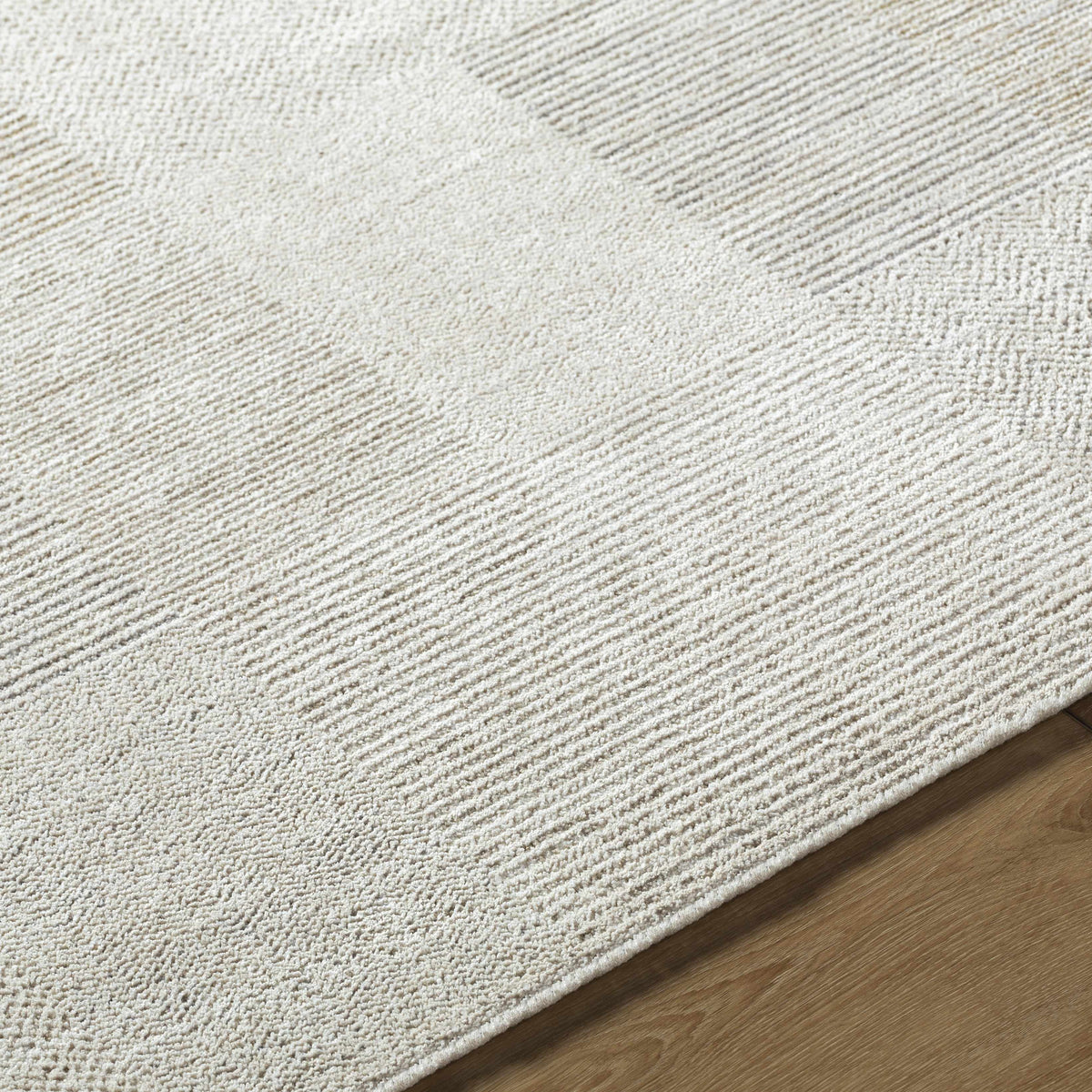Close-up of the textured Radia Luxe Rug by Boutique Rugs, showcasing its soft, woven surface and intricate pattern.