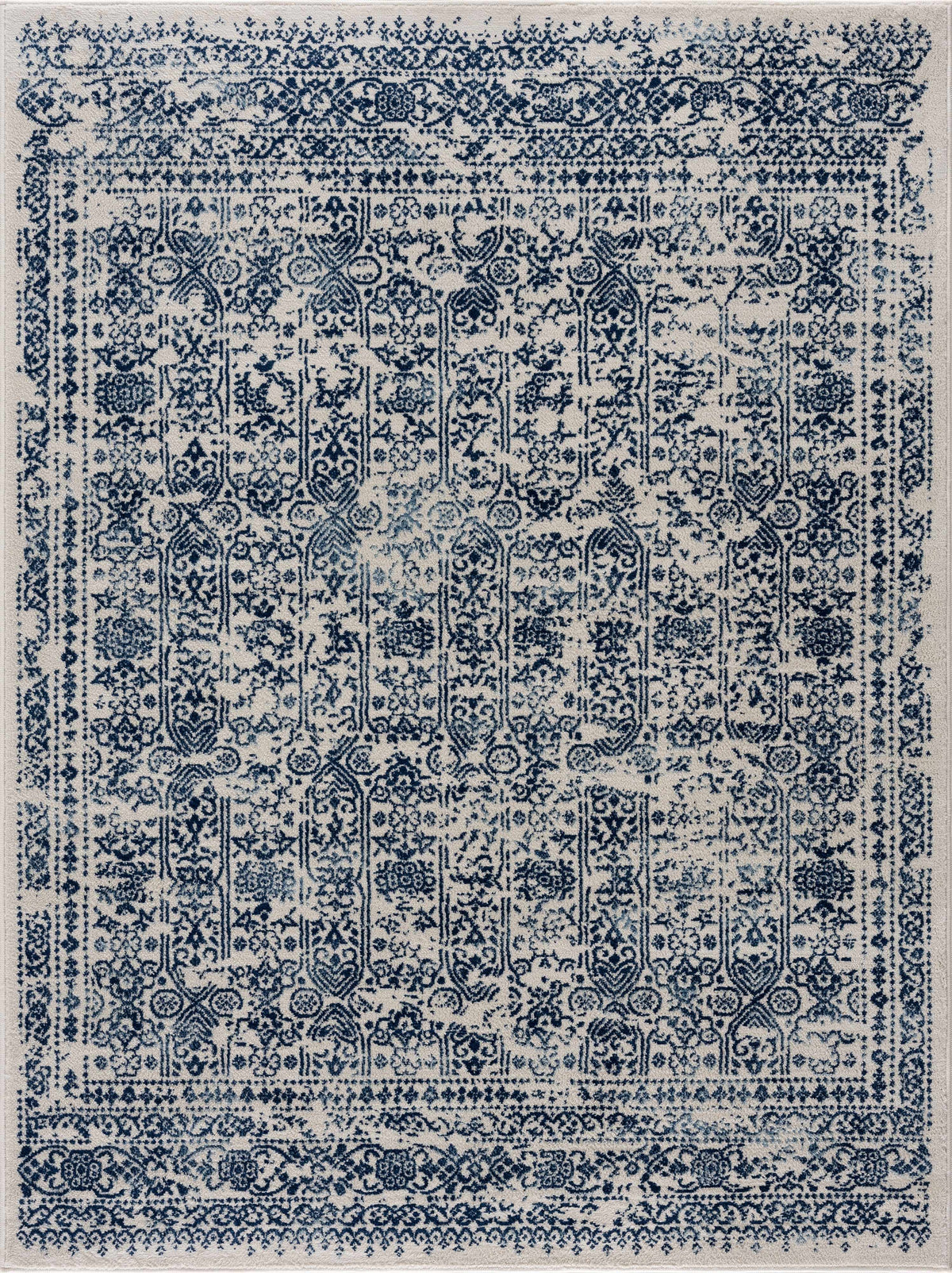 Hauteloom Michie Blue area rug with geometric pattern, soft fabric, and modern design for living room or bedroom decor.