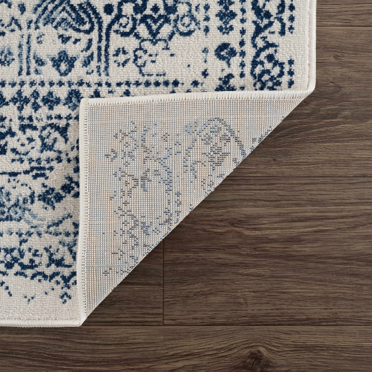 Hauteloom Michie Blue Area Rug with geometric pattern, soft texture, ideal for living room or bedroom decor.