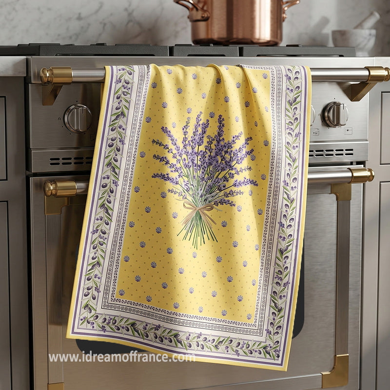 Yellow printed cotton French kitchen towel by I Dream of France, featuring Lauris design for stylish kitchen decor.