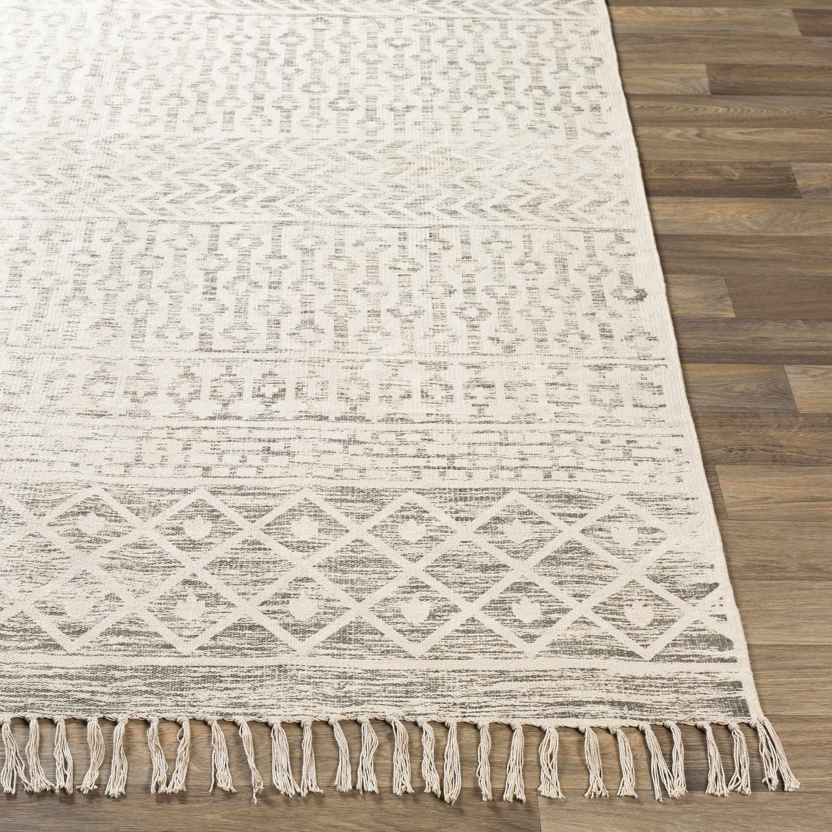 Front view of the Valyermo beige hand-woven cotton rug by Boutique Rugs, showcasing its textured, natural fiber design.