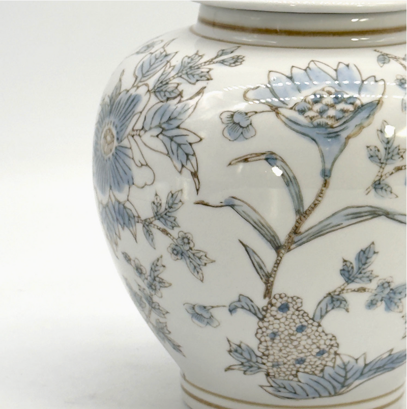 White and blue ceramic Chinoiserie floral vase, 10-inch decorative jar with intricate floral patterns.
