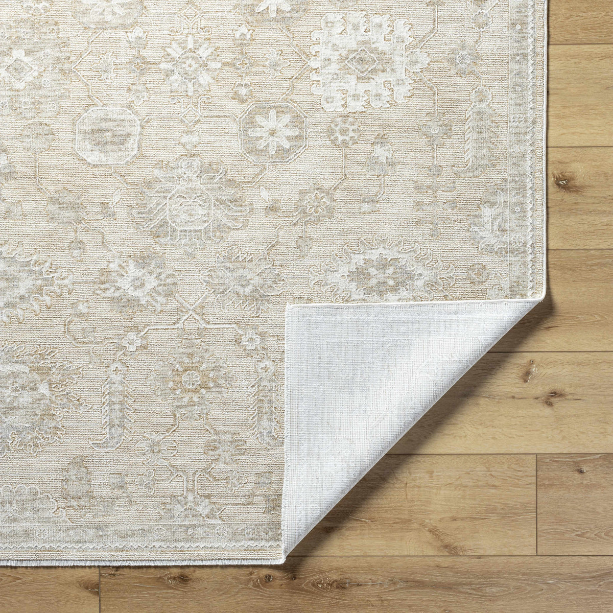 Boutique Rugs Yonca Luxe Rug folded, showcasing its soft texture and elegant design, ideal for modern living spaces.